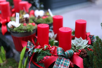 Christmas decoration in interior. An advent wreath with four red candles