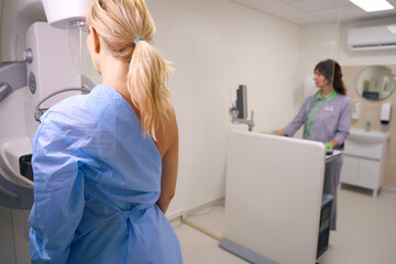 Client is receiving diagnostic mammogram in medical facility