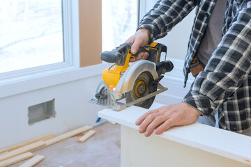 Manual circular saw must be used to cut interior doors to their required dimensions prior to...