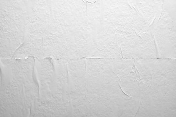 Abstract background of white paper with folds.