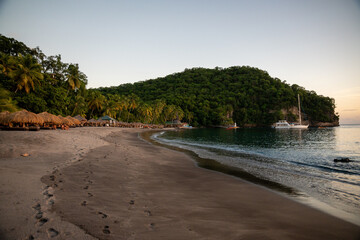 Sunset at Anse Chastanet Jade Mountain Resort beach on Saint Lucia.  Shot on a mirrorless camera on the Caribbean island nation of St. Lucia with the Caribbean Sea in the background.