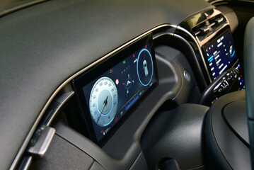 Digital instrument panel in a modern car - 690301889
