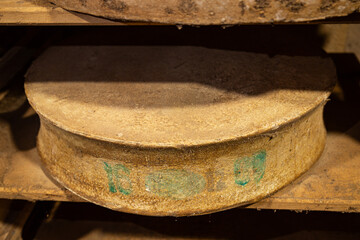 Fototapeta premium aged cheese in the cellar ready to eat eating cooking appetizer meal food snack on the table copy space food