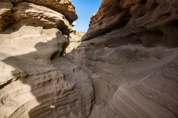 Photo sur Plexiglas Ventifact rock formations caused by wind at La Pared Beach, Fuerteventura