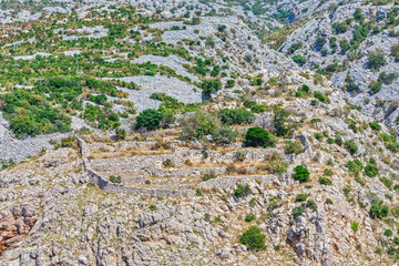 Fototapeta na wymiar Rocky Terrain at the Foot of Velebit Mountain