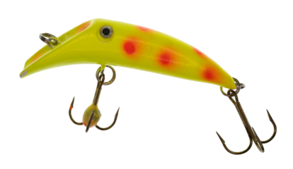 Macro image of a bright yellow fishing lure that has orange spots a silver / black “eye”. The lure has two treble hooks.  On a clean background.
