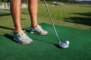 Striking Success: Young Man's Debut Golf Drive