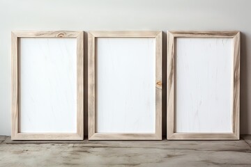 Three blank canvases on wooden frames leaning against a wall. Wallart Mockup Concept. Ideal for art, creativity, and DIY projects - obrazy, fototapety, plakaty