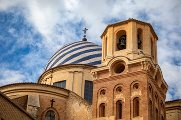 Detail of the tower and dome with blue and white stripes of the Basilica of the Purísima Concepcion in Yecla, Region of Murcia, Spain - obrazy, fototapety, plakaty