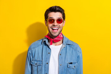 Portrait of impressed man dressed shirt red scarf touching sunglass straing at big sale isolated on...