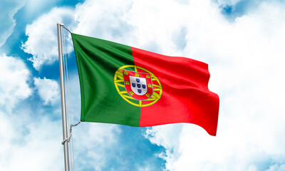 Portugal flag waving on sky background. 3D Rendering.