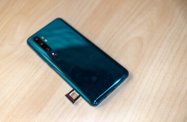 SIM card is removed from the cell phone