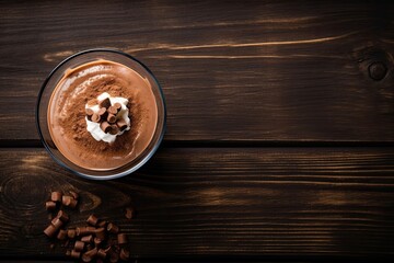 Hot chocolate for breakfast on a dark wooden table top view, banner style, generated with AI