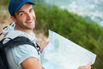 Man, hiking and map for direction, portrait and guide on trail, fitness and exercise on holiday....
