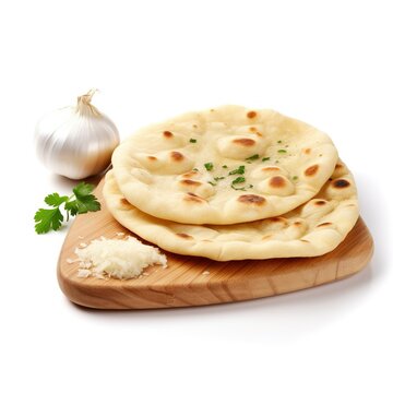 Indian naan bread with garlic and butter isolated on white background