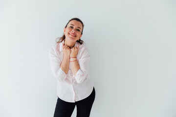 Portrait of a woman 40 years old on a white background