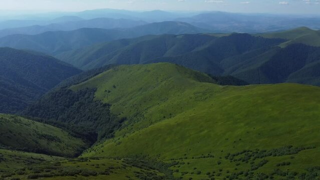 Aerial photography of mountain valleys in the Carpathian Mountains. Drone view from Mount Styi in the Ukrainian Carpathians.