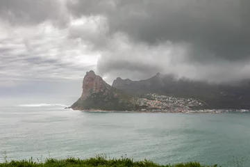 Foto op Aluminium Hout Bay, a fishery town on the Cape Peninsula south of Cape Town, South Africa, is seen under stormy spring skies © Colin N. Perkel