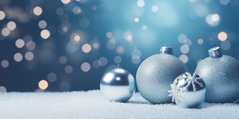 Blue Christmas balls with decoration on shiny blue background with copy space, Xmas festive celebration backgrounds.