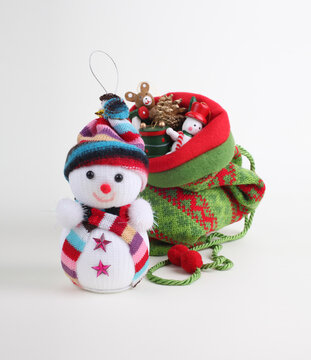 Christmas knitting bag with Small decorative Christmas gift toys.