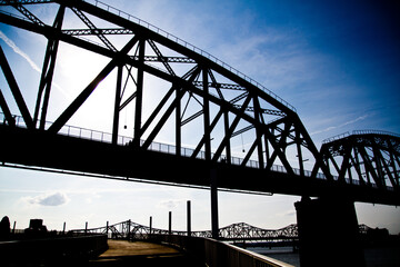 Sunlit Silhouettes of Steel Truss Bridges in Louisville, Kentucky