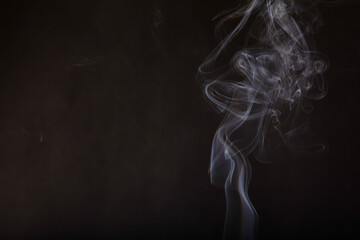 Ethereal Dance of Backlit Incense Smoke