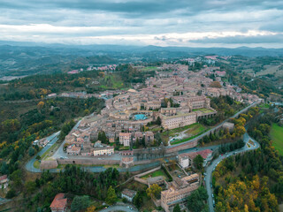 Italy, 08 December 2023 - panoramic aerial view of the medieval village of Urbino in the province...