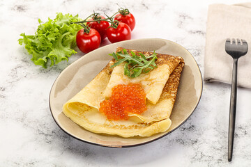 Russian pancake with red caviar
