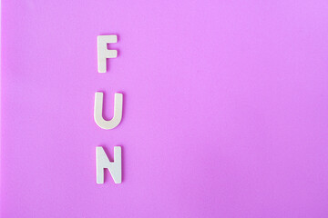 fun letters on pink background