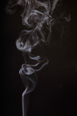 Ethereal Dance of Incense Smoke on Dark Background - obrazy, fototapety, plakaty