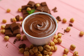 chocolate paste with a bowl on a table. 
