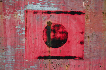Abstract Aged Red Square and Circle on Weathered Urban Surface