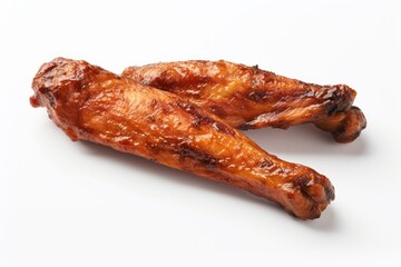 two meat sticks on a white tablecloth against a white background