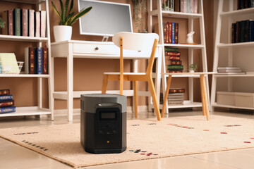 Portable power station on carpet in office