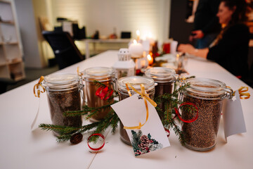Christmas table with jars of various spices - Powered by Adobe