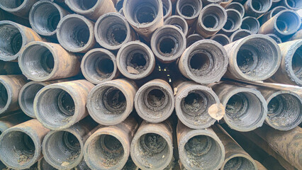 Stacked drill pipe or drill stem, used drilling rusty metal pipes