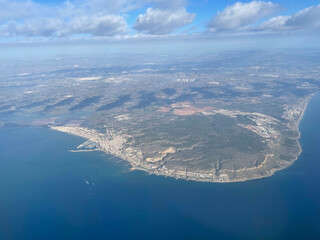 Santa Pola coastline landscape aerial view. Alicante province drone view. Sunny cloudy day. Tourism in Spain. High quality photo
