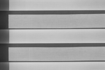 Simple black and white 3d background. Striped curtains on the window. Empty copy space for design. 