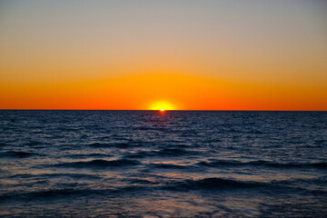 Golden Hour Tranquility: Sunset Over Lake Michigan