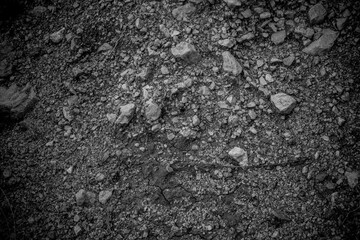 Earth surface with different size stones. Background of stone soil for publication, poster,...