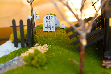 Miniature Halloween Graveyard Scene with Focus on RIP Tombstone