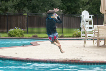 Naklejka premium child playing in the pool