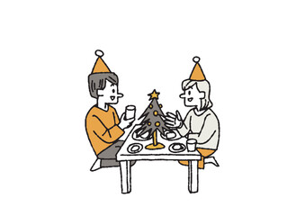 ツリーと食事を楽しむカップル　クリスマスのホームパーティーや家族との時間を楽しむ人々