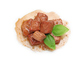 Pieces of delicious cooked beef and basil leaves isolated on white, top view. Tasty goulash