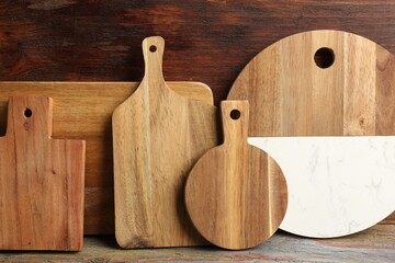 Set of different cutting boards on table