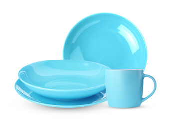 Clean plates, bowl and cup on white background
