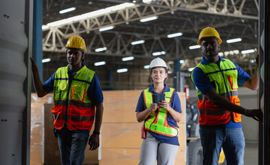 Foreman workers working in warehouse talking about job, Warehouse worker team checking containers boxes, Workers team taking inventory in factory warehouse