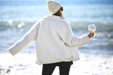 girl with a glass of wine mediterranean sea winter, vacation happiness europe france nice