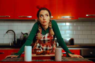 Tired Housewife After Cooking a Family Diner for Holidays. Stressed woman trying to figure out how to plan for the holidays 
