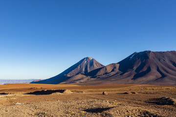 Fototapeta na wymiar Licancabur and Juriques volcanoes located between the borders of Chile and Bolivia.